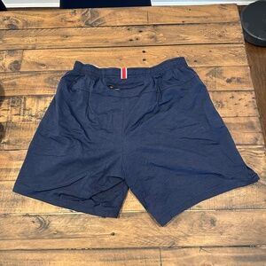 Tracksmith Navy Athletic Shorts with Red-White Waist Tab
